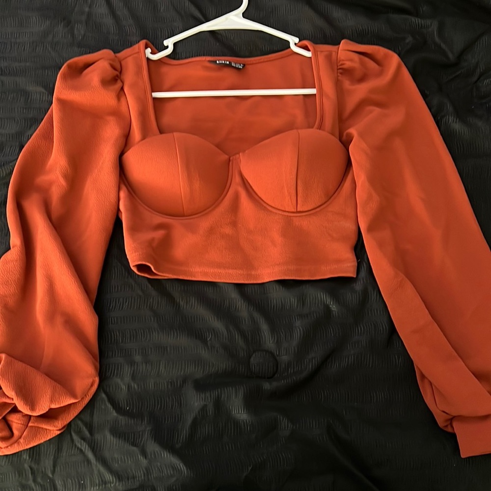 Rust orange cropped bell sleeve top